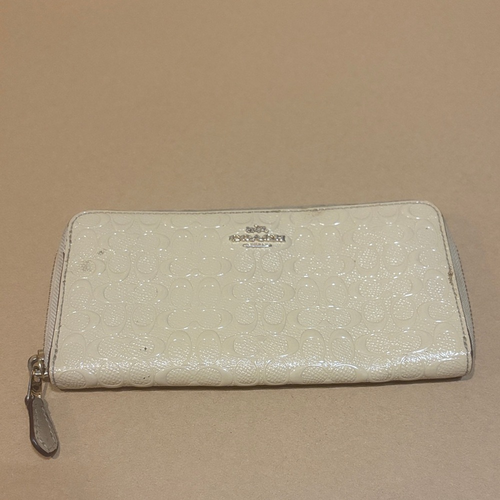 Coach embossed light beige wallet